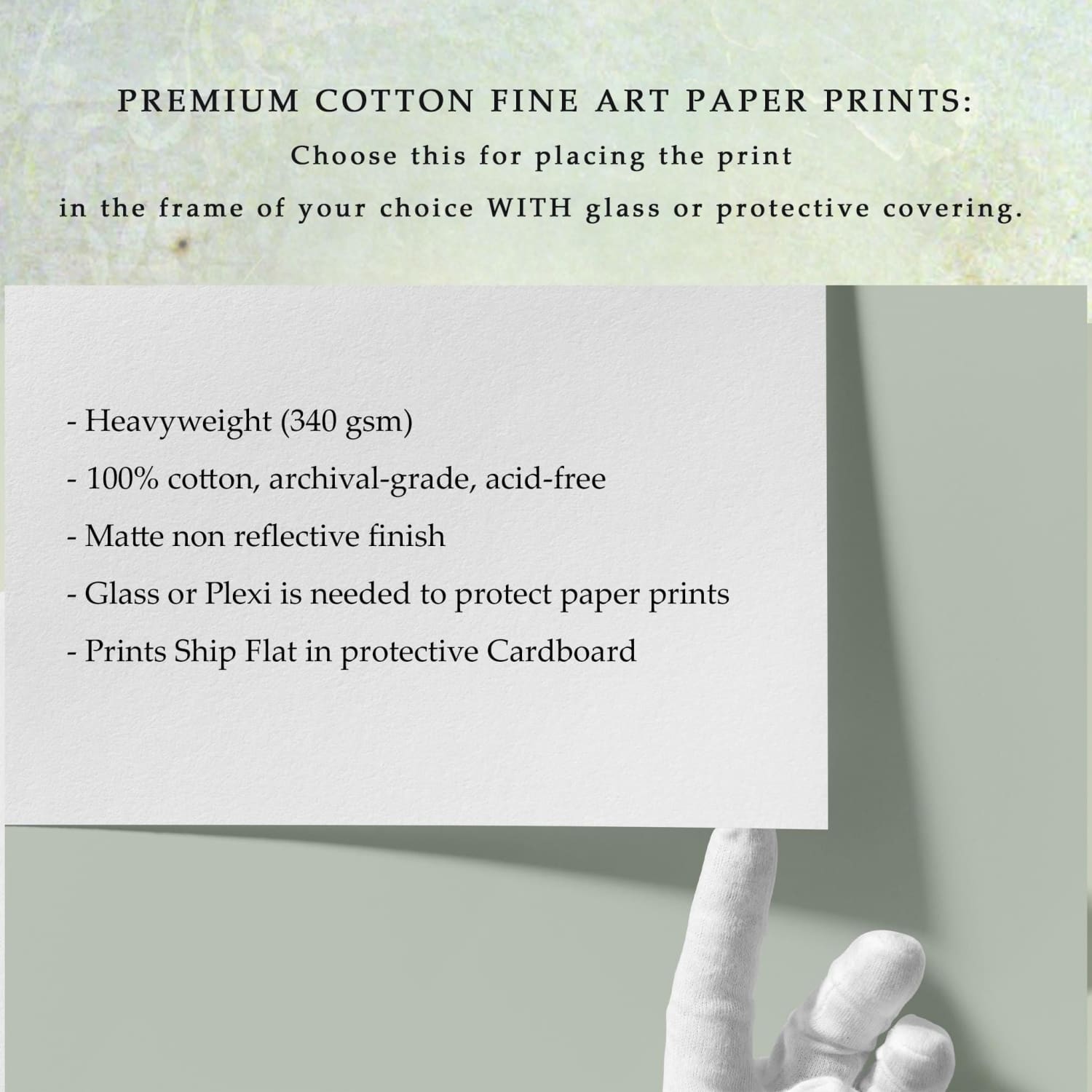 a hand holding up a piece of paper