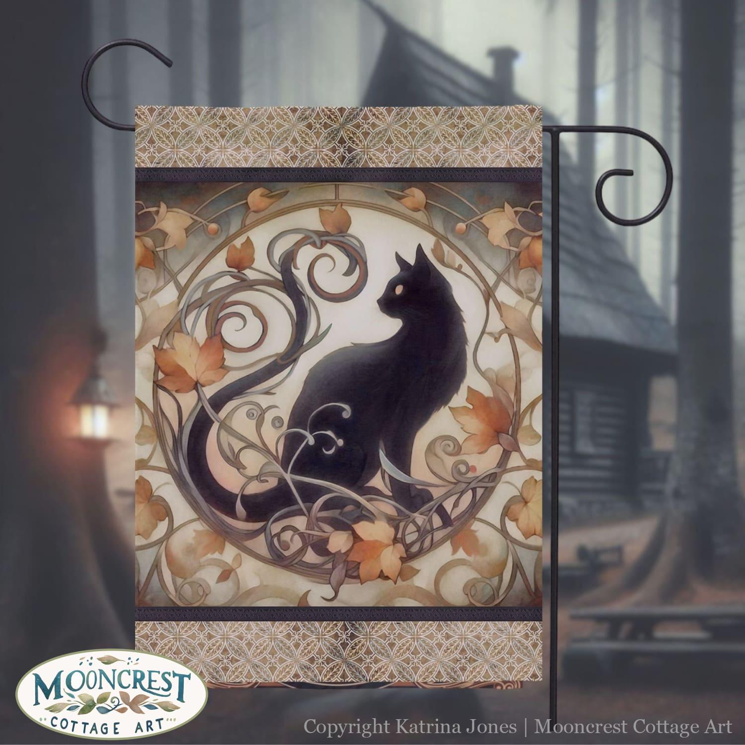 a black cat sitting on top of a wooden plaque