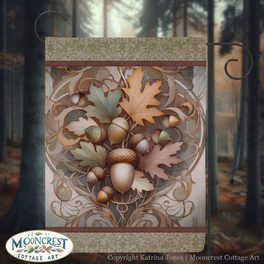 a picture of a leaf and acorn design