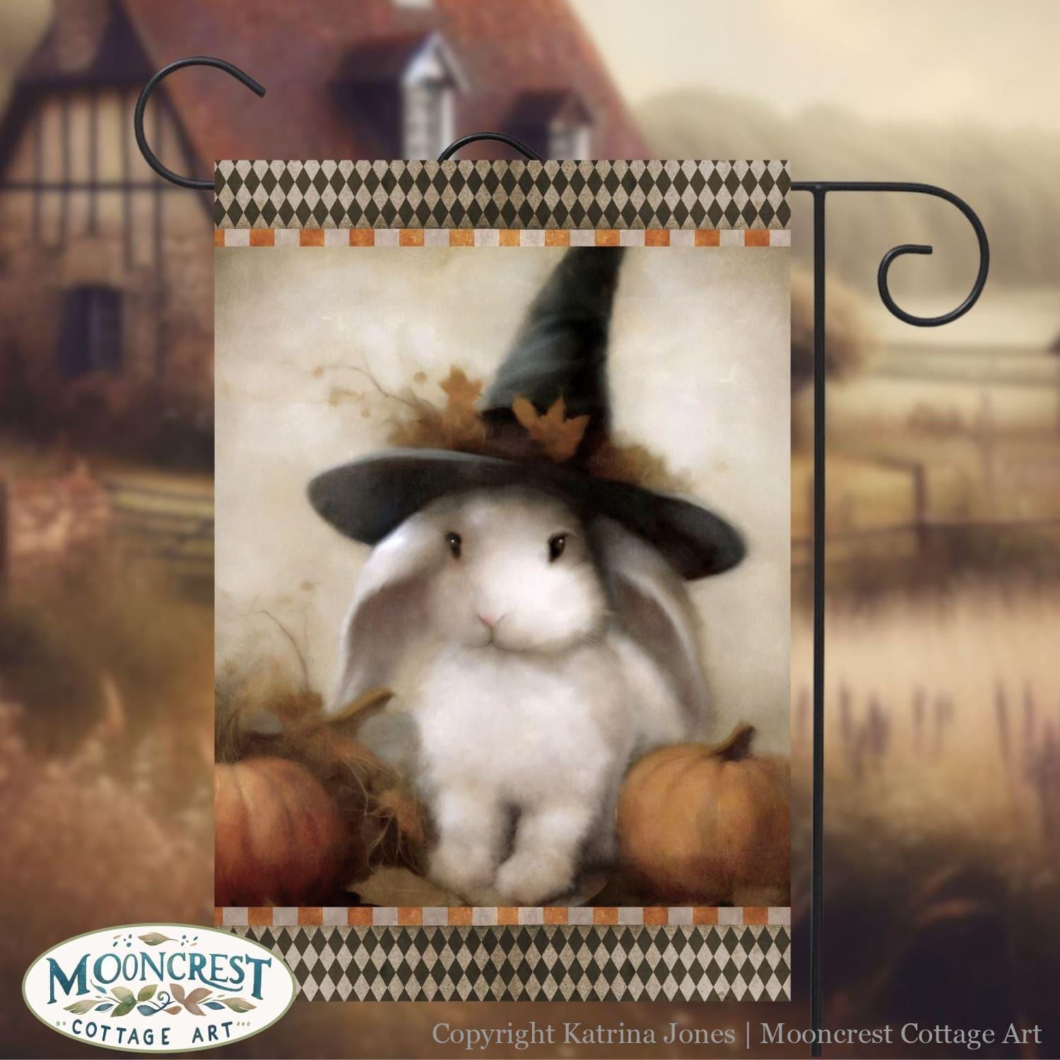 a picture of a rabbit wearing a witches hat