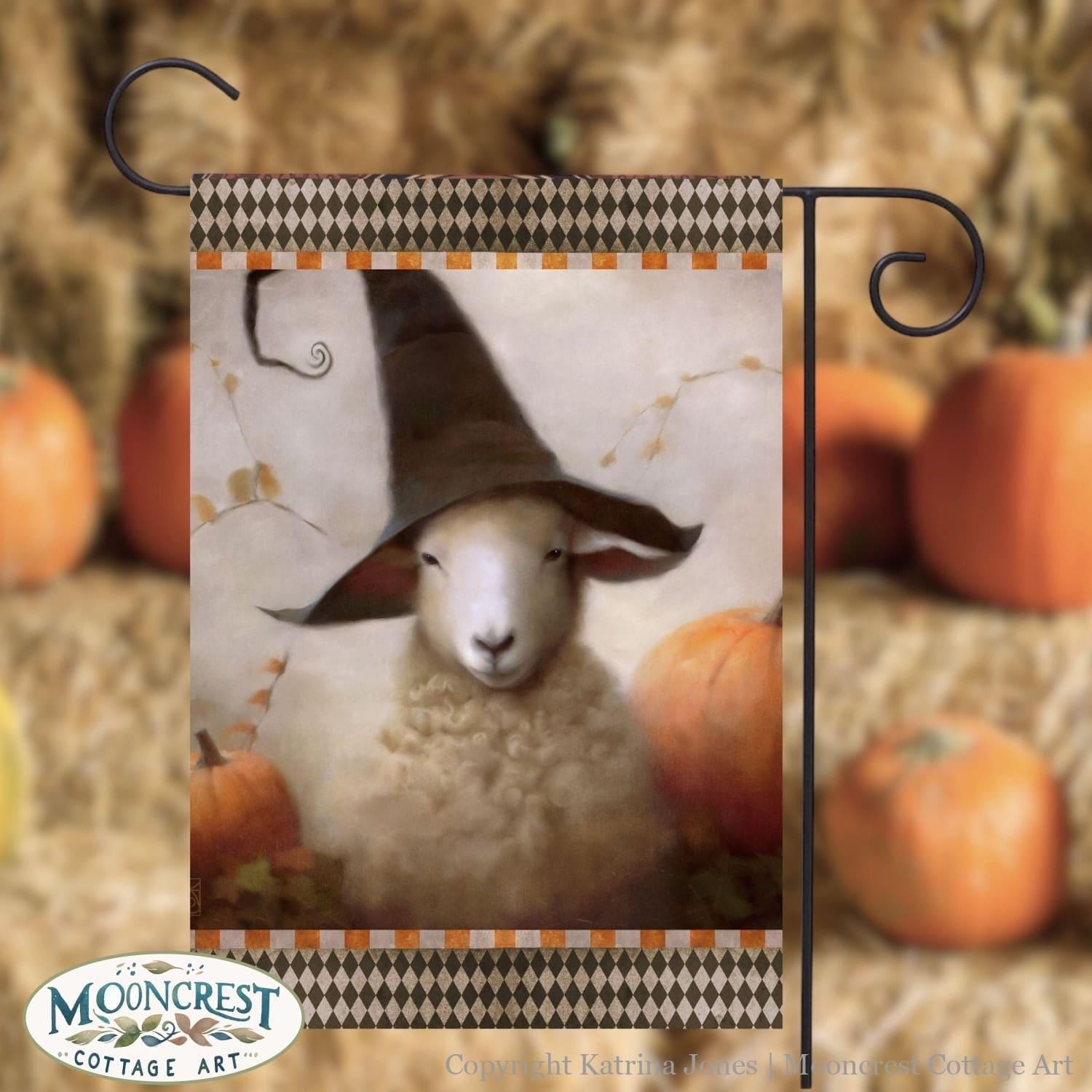 a picture of a sheep wearing a witches hat