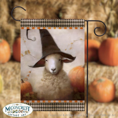 a picture of a sheep wearing a witches hat